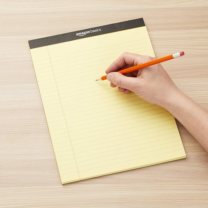 Amazon Basics Wide Ruled Lined Writing Pads, 8.5" x 11.75", Canary, 12-Pack of 50 Perforated Sheets, Sturdy Backing