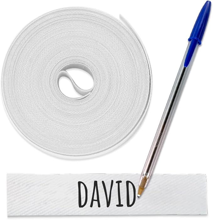 Haberdashery Online White Tape of 3 x 1 cms and Pen incluyed. Iron on Fabric Labels. Iron on Clothing Labels. Personalized Clothing Name Tags for Nursing Homes, Camp, Uniforms, Day Care and College