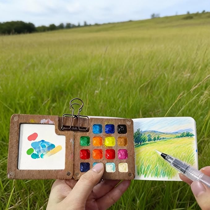 Portable Mini Watercolor Paint Set, 24 Colors Travel Watercolor Kit with Wooden 15 Grid Palette, Sketchbook, Brush & Waterproof Bag for Beginners, Artists, Outdoor Painting