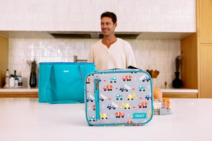 PackIt Freezable Classic Lunch Box, Construction Trucks | Built-in ice packs, EcoFreeze+ Technology, Zip Closure, Zip front pocket, Side-release buckle handle, Collapsible, Reusable