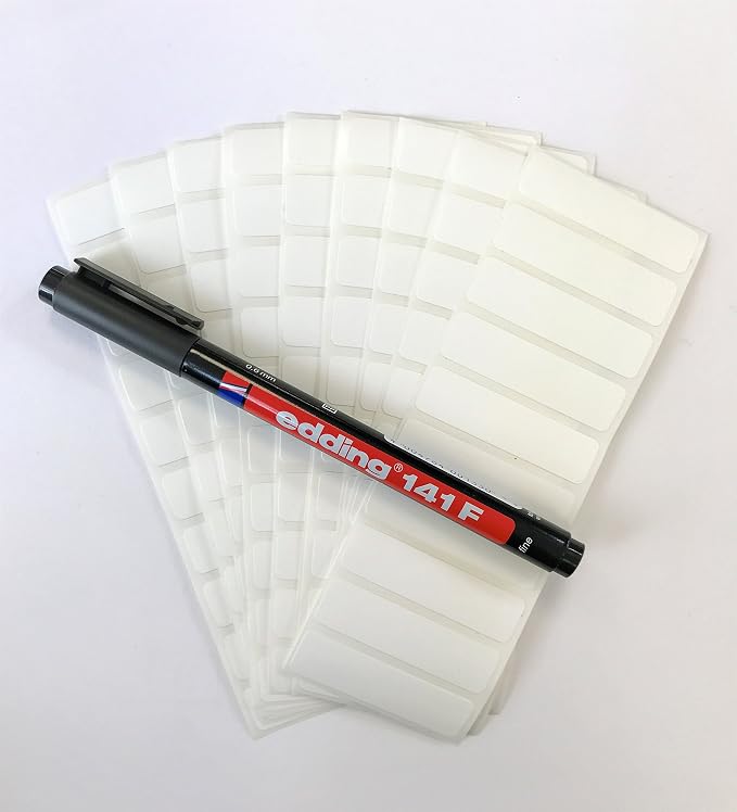 100 Blank Iron-On Clothing Labels with a Black Permanent Laundry Marker.